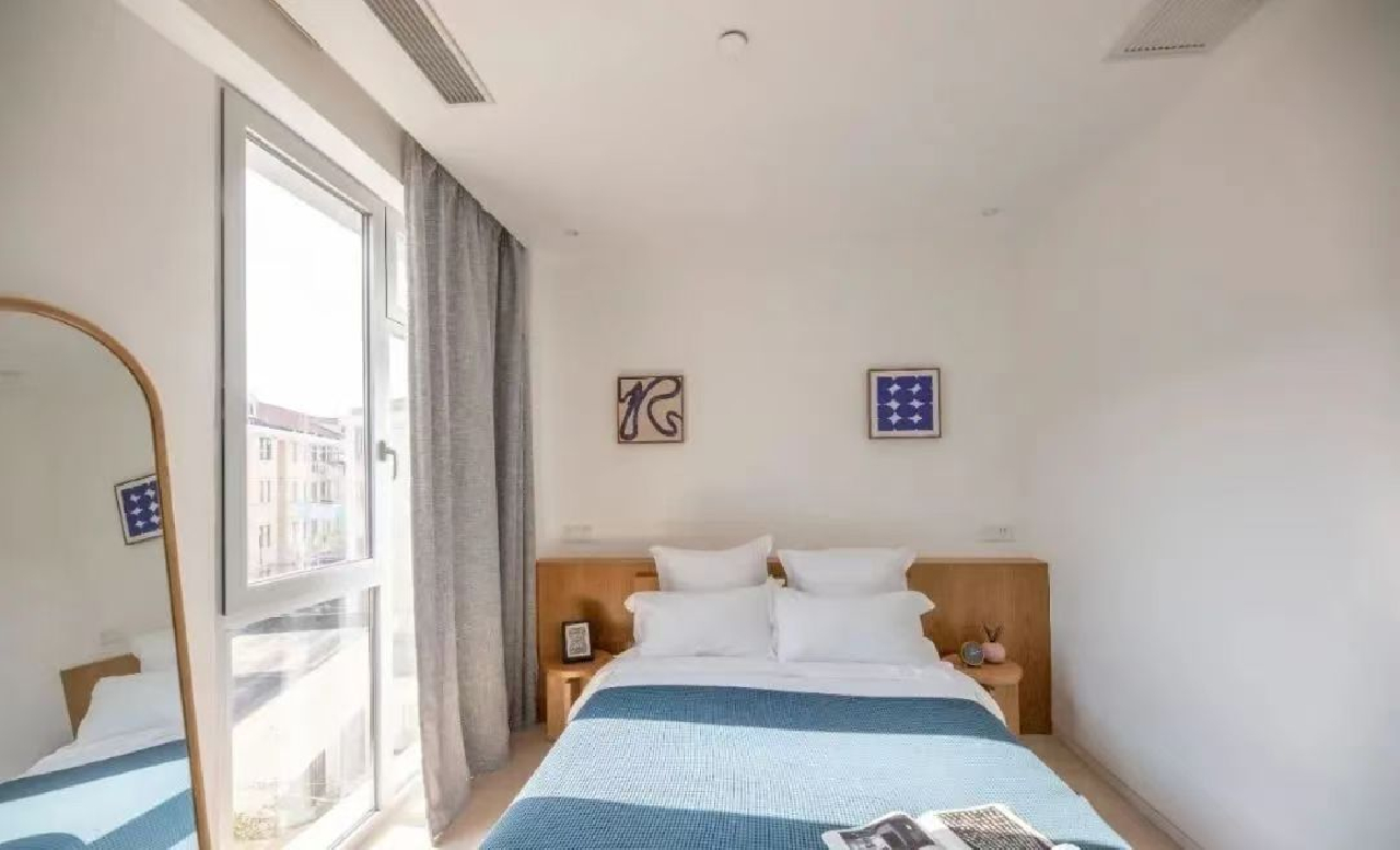 Base LIVING-YUPING Serviced Apartment - Image 4